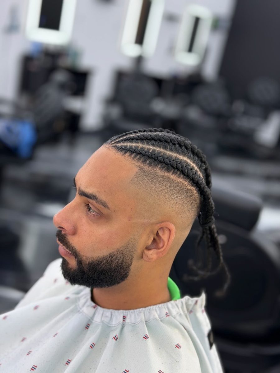 Cornrow braids with skin fade and beard